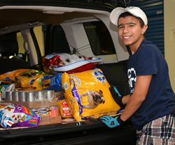 Bud Loading Up Pet Food for Delivery to the Food Pantries