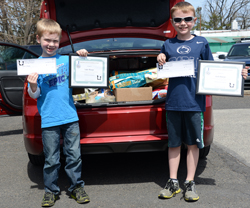 Jack and Luke with a Trunk Full of Pet Food, Treats and Supplies